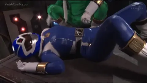 Asian Men in Power Ranger Costumes Engage in Intimate Scene