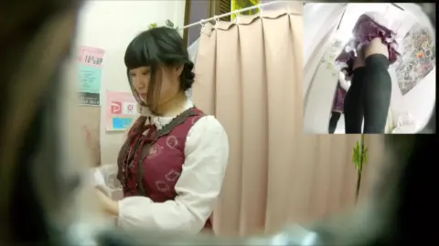 Asian Girl Undressing in Dressing Room