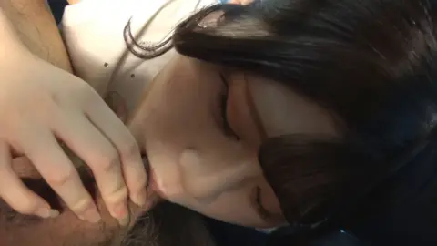 Couple Engaged in Intimate Act