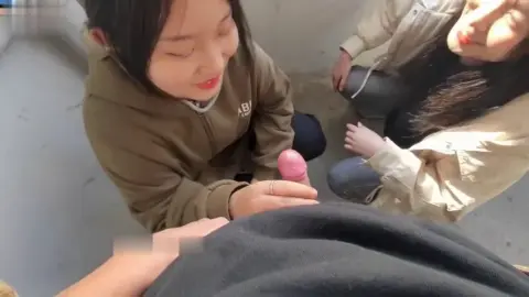 Asian Girls Give Handjob in Brown Hoodie and Beige Jacket