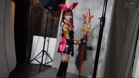 Asian Women with Pink Accents Posing with Weapons