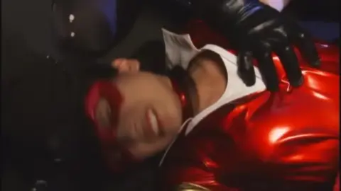 Red Masked Beauty in Restraint