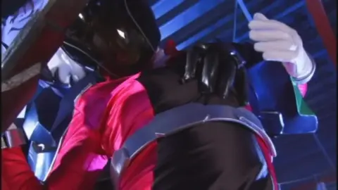 Asian Men in Costumes Engage in Intense Action