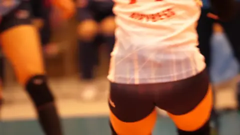 Asian Volleyball Players in Uniform