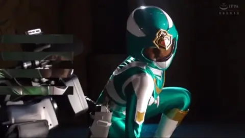 Asian Woman in Green Costume