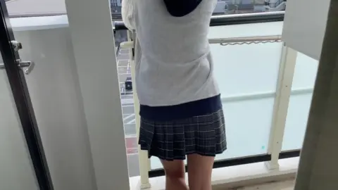 Asian Teen in School Uniform
