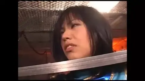 Asian Girl in Blue Dress and Fishnet Stockings Performs Intimately