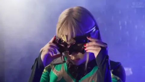 Lesbian Duo in Masks and Costumes
