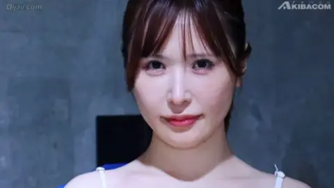 Asian Couple Intimate Moments in Bedroom