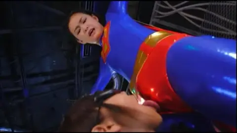 Asian Duo in Martial Arts Costumes Engage in Combat