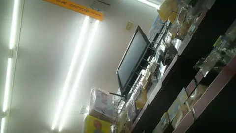 Asian Girls Shopping in Store