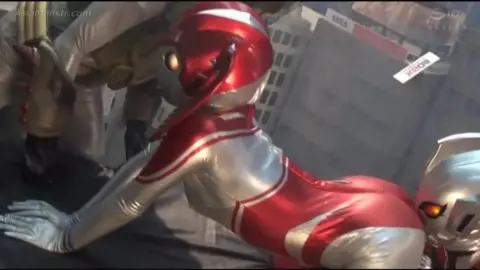 Asian Women in Robotic Costumes