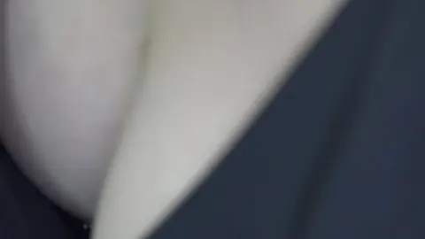 Asian Teen in Black Dress and Pearl Necklace