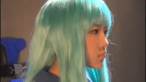 Asian Teen with Colorful Hair in Intimate Moments