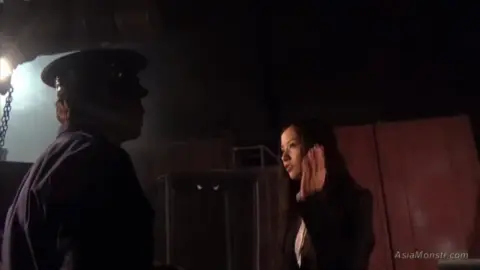 Asian Duo in Police Uniforms Encounter