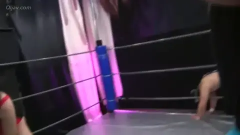 Asian Women Wrestling in Ring