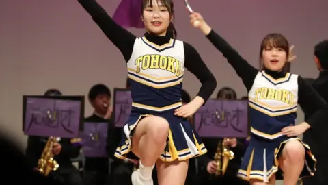 Cheerleaders in Uniform