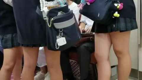 Asian Schoolgirls on Train