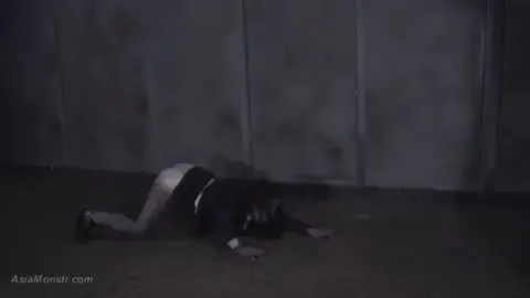 Blonde Women in Restraint and Domination Scene