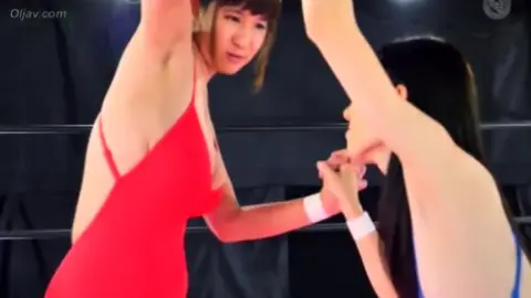 Asian Lesbians Wrestling in Pink Ring