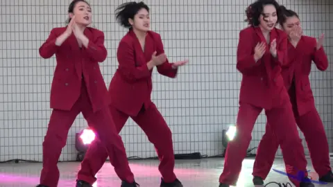 Asian Girls Dancing on Stage