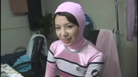 Asian Woman in Pink Costume