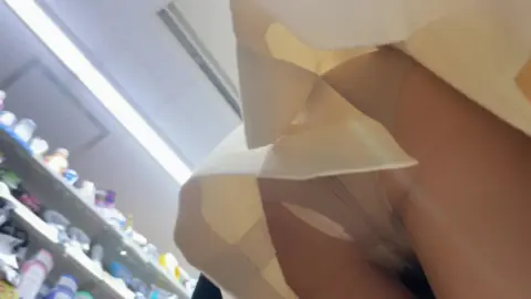 Asian Teen in Store Setting