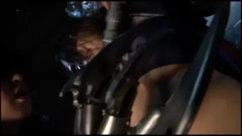 Asian Women in Costumes Engage in Domination and Restraint