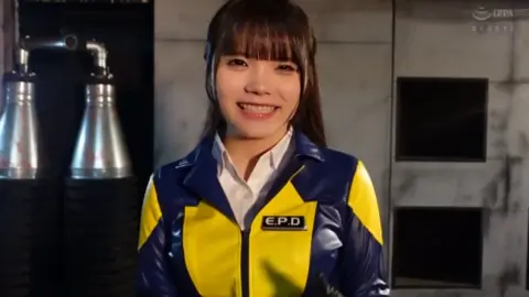 Asian Girl in EPD Jacket Industrial Setting