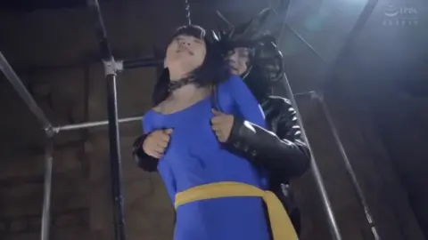 Asian BDSM Scenes with Restraint and Dramatic Lighting