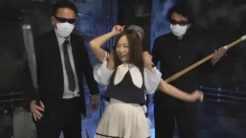 Asian Schoolgirl and Masks Dance