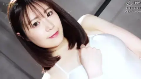 Asian Couple Wrestling in Bedroom