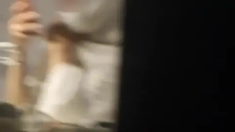 Asian Teen with Short Black Hair in Bathroom