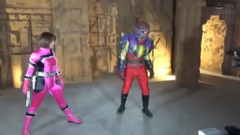 Asian Couple Engages in Temple Battle