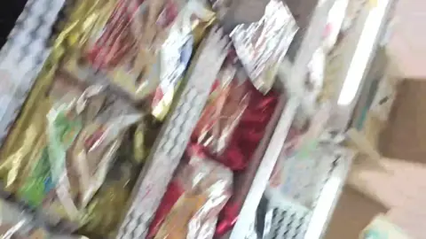 Asian Girls in Plaid Skirts Store Scene