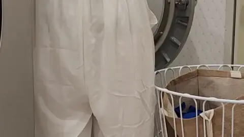 Asian Girl Doing Laundry