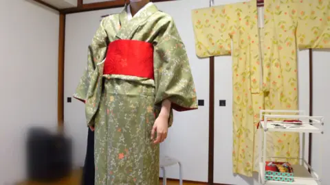 Asian Couple Dressing in Kimono