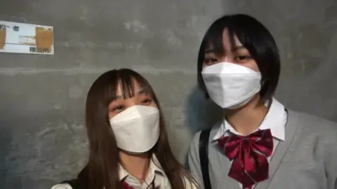 Asian Teens in School Uniforms