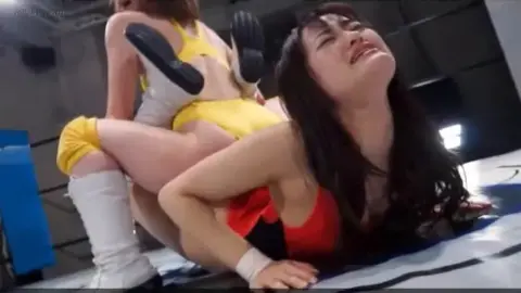 Asian Lesbians Wrestling in Ring
