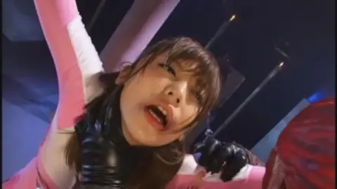 Asian Performer in Pink Costume Performs with Male Partner