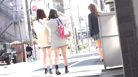 Asian Schoolgirls in Miniskirts