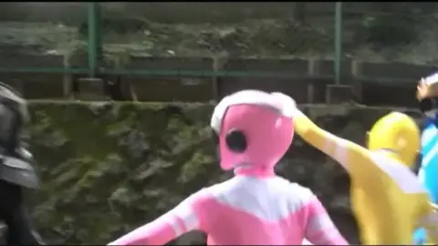 Asian Women in Spandex Fight Outdoors