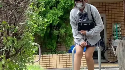 Masked Girl Masturbating on Bench