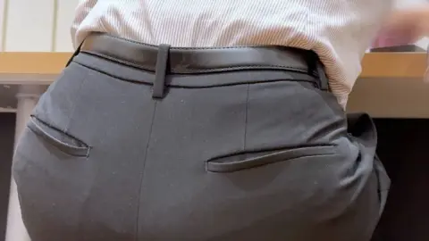 Asian Brunette in Office Setting