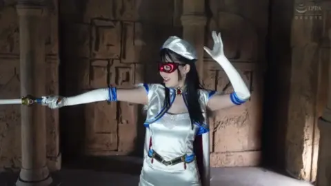 Asian Cosplayers in Superhero Costumes