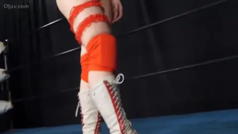 Asian Women Wrestling in Ring