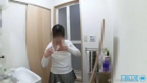 Asian Teen Undresses in Bathroom