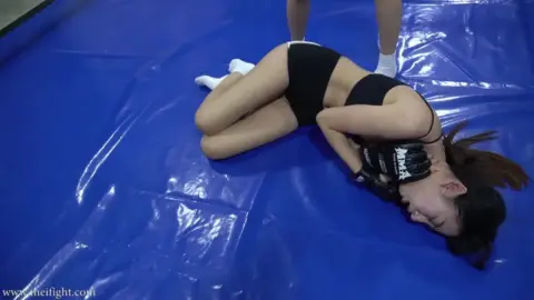 Asian Lesbians Engage in Intense Gym Fight