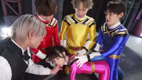 Costumed Girl Surrounded by Group