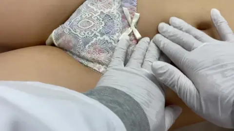 Asian Teen Bra Exam in Medical Office